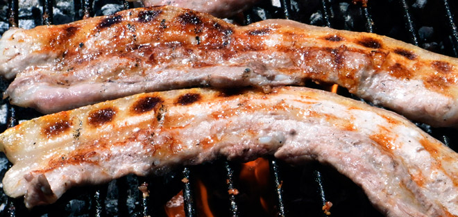 Bacon grilled on the barbecue.