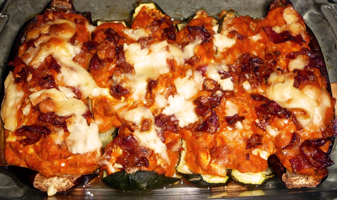 Stuffed eggplant in an oven tray.