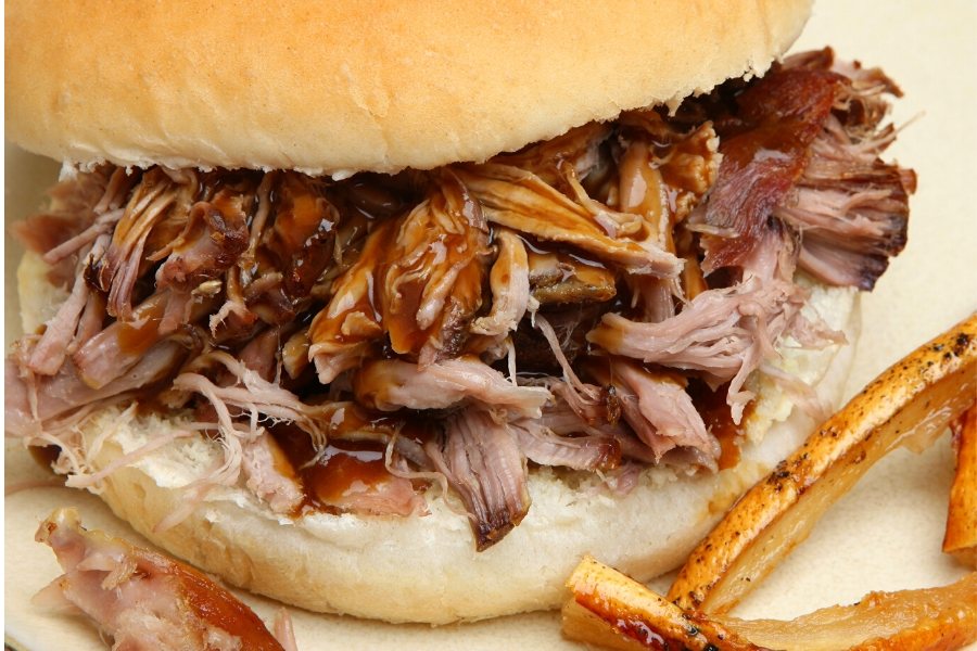 Pulled pork with barbecue sauce in a bun.