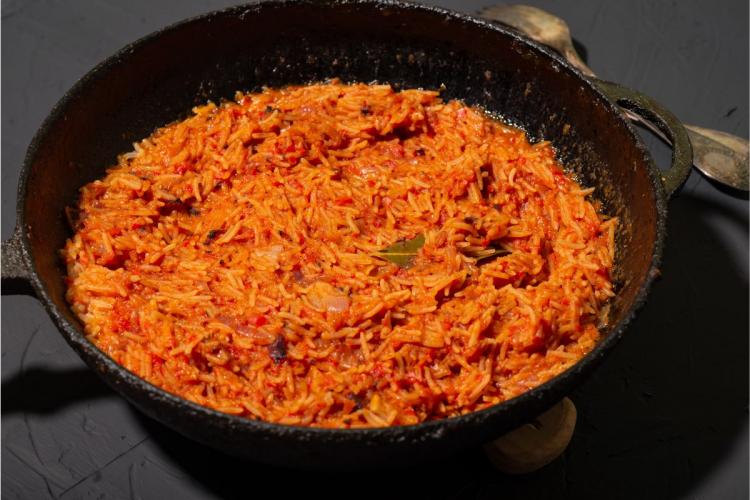 Simple jollof rice in a pan.