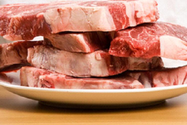 Raw beef steaks.