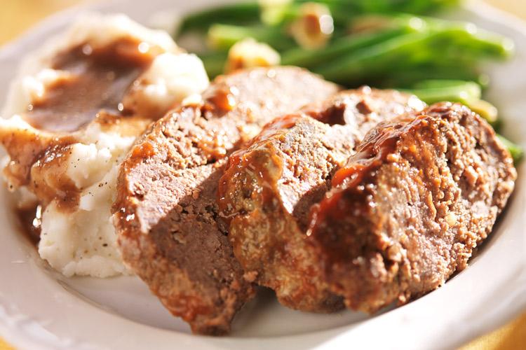Meatloaf with mash potato and green beans.