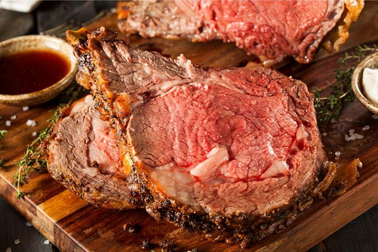 Close up of a perfectly done prime rib roast.