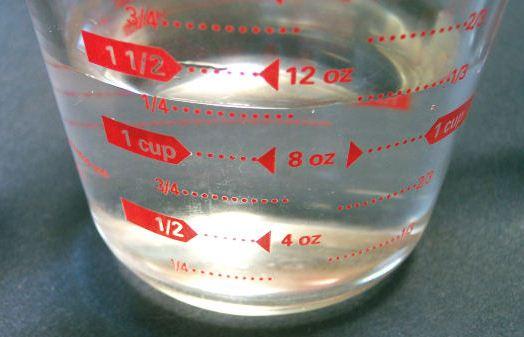 Measuring jug, measuring pitcher.