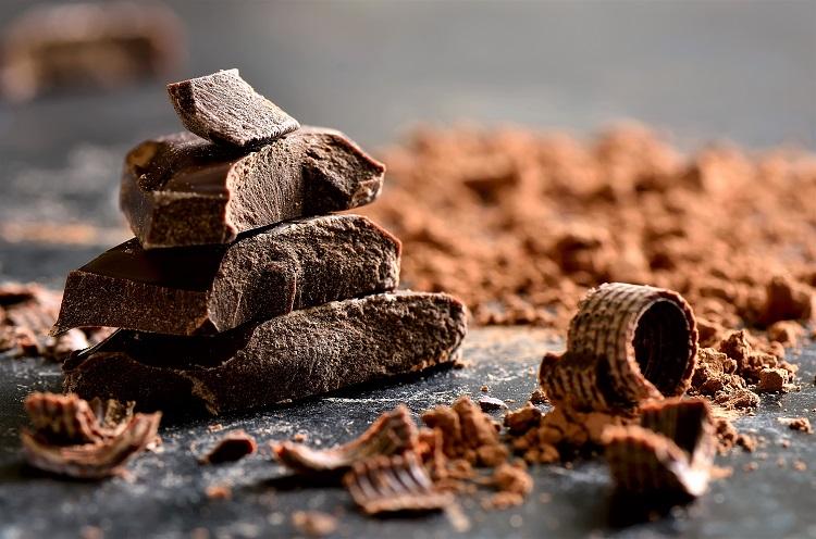 Dark chocolate slivers and chocolate powder.