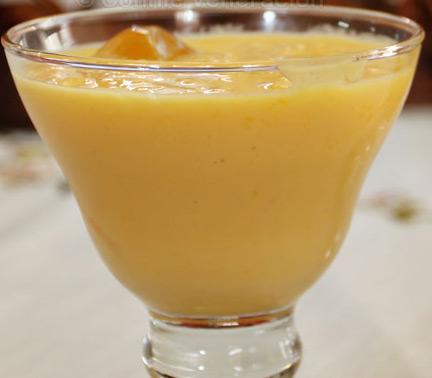 mango lassi in a cup.