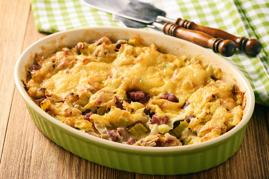 Top view of cheesy leek and ham bake.