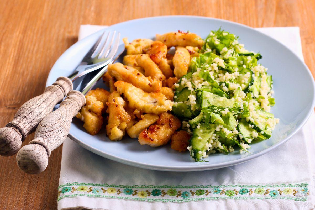 Honey mustard glazed chicken with vegetable couscous on the side.