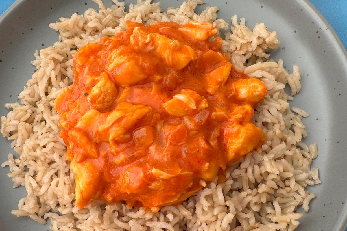 Lobster with ketchup-mayonnaise sauce, Bahamian style, over brown rice.