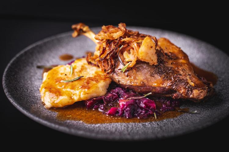 Roast goose on a plate.