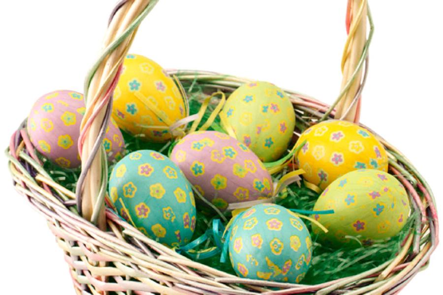 A basket with decorated Easter eggs.