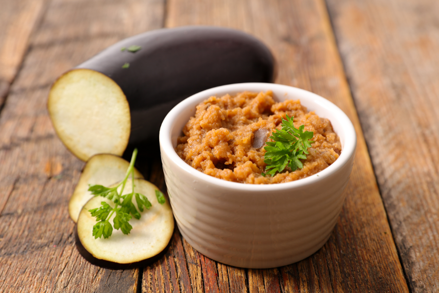 A small bowl with eggplant paste.