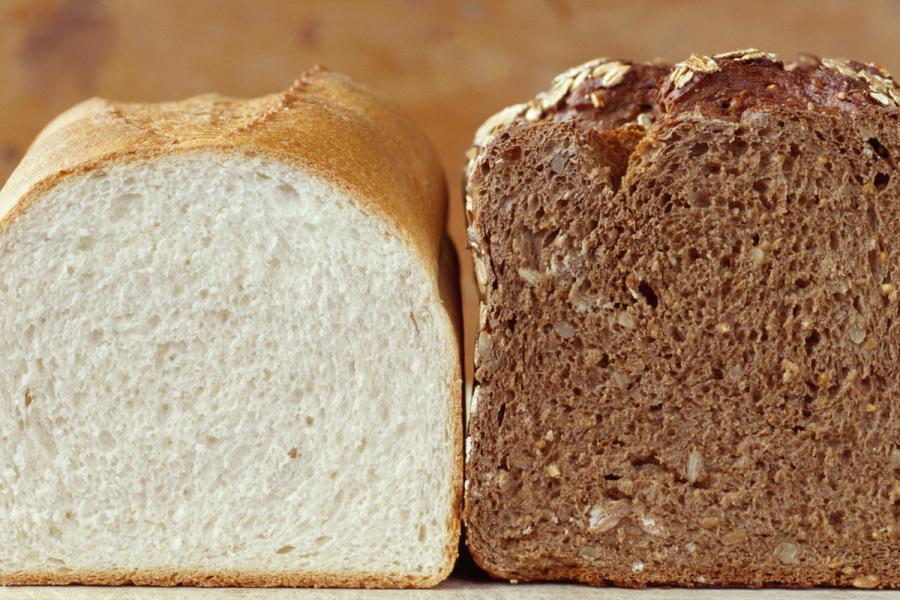 One white bread loaf and one wholegrain bread loaf.