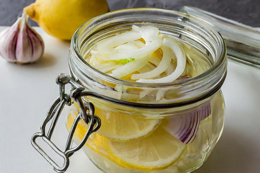 A jar with lemon ketchup ready to refrigerate.