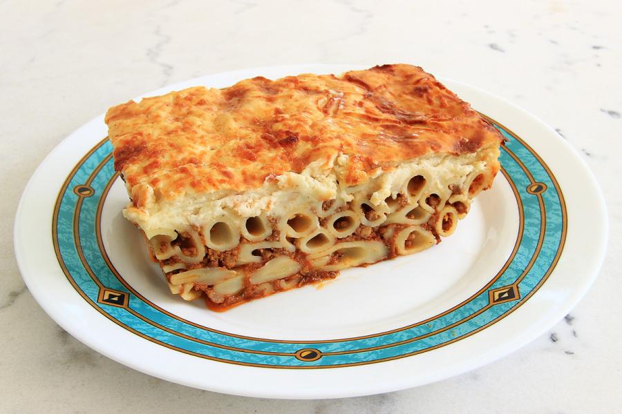 A plate with a portion of Greek pastitisio.