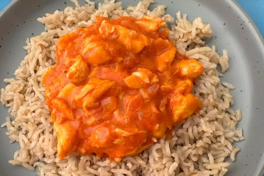 Lobster with ketchup-mayonnaise sauce, Bahamian style, over brown rice.