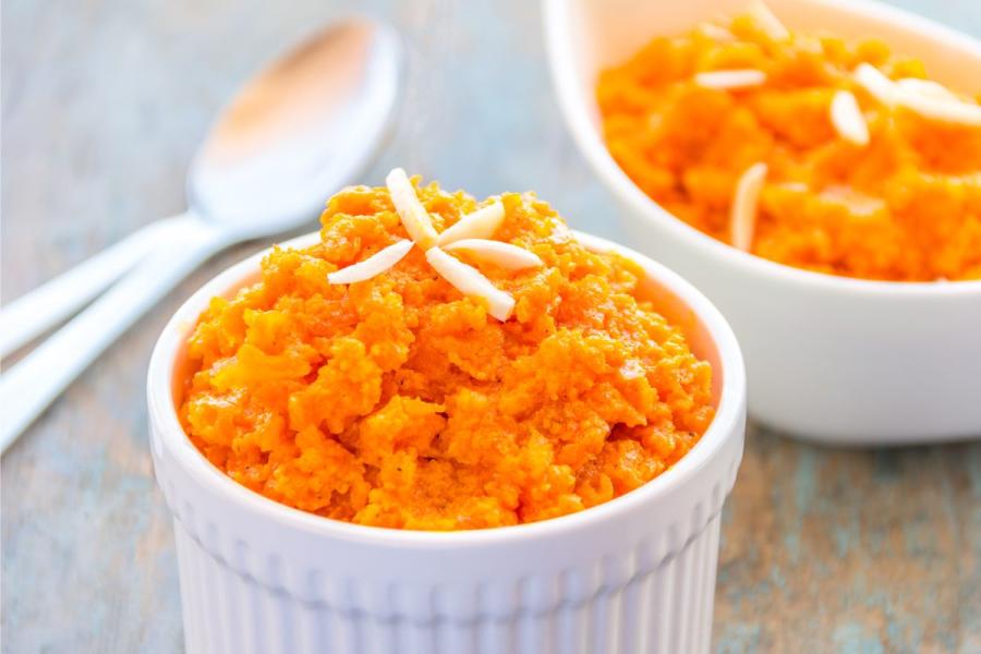 Individual pots with carrot halwa, or gajar ka halwa. 