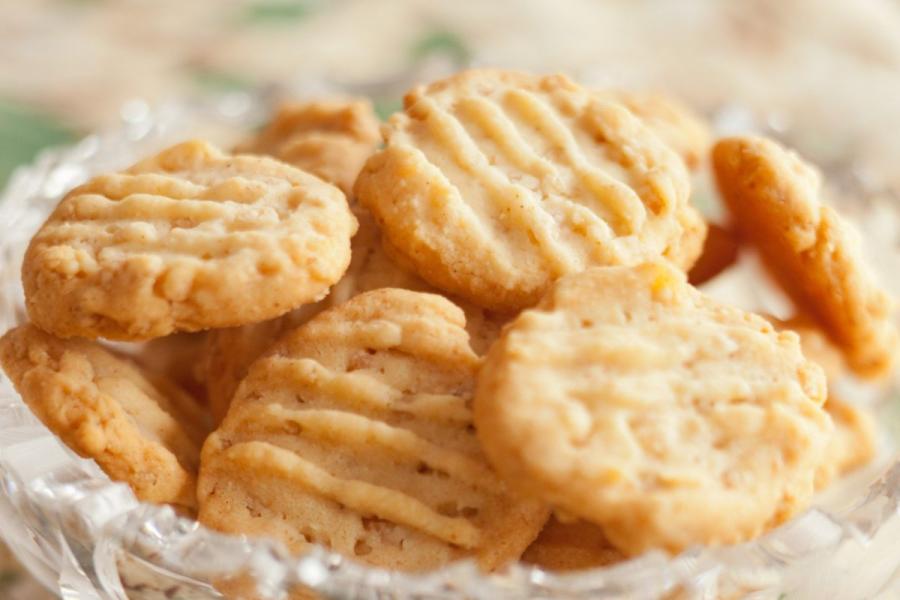 A serving dish with homemade cheese wafers.