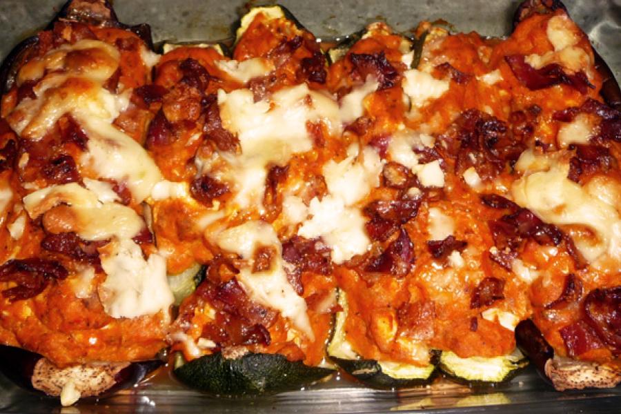 Stuffed eggplant in an oven tray.