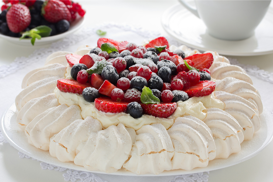 A pavlova with berries as topping.